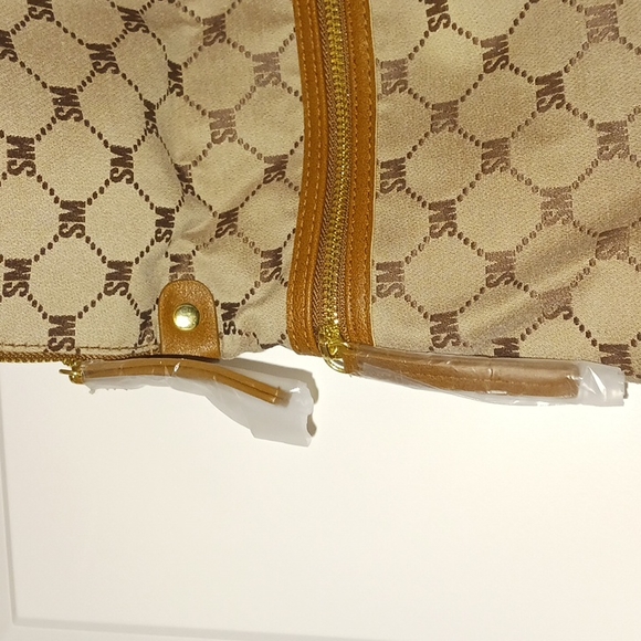 NWT Steve Madden - Embossed Logo Backpack with Charm Accessory - Picture 9 of 15